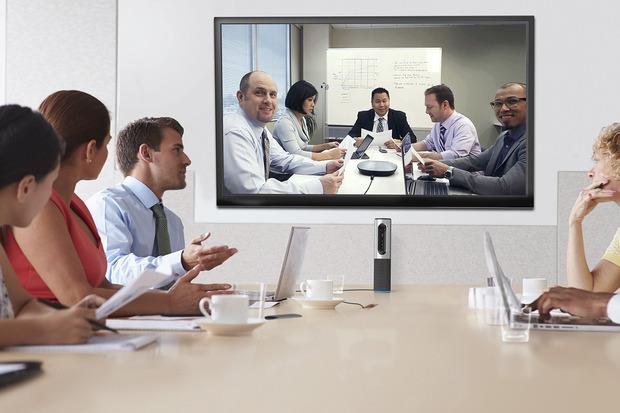 The videoconferencing image is unclear about which devices.jpg